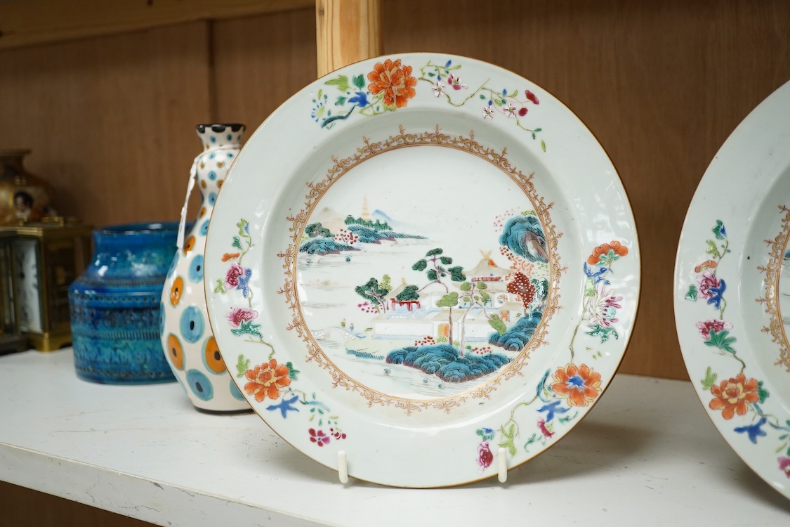 A pair of 18th century Chinese famille rose landscape dishes, 23cm